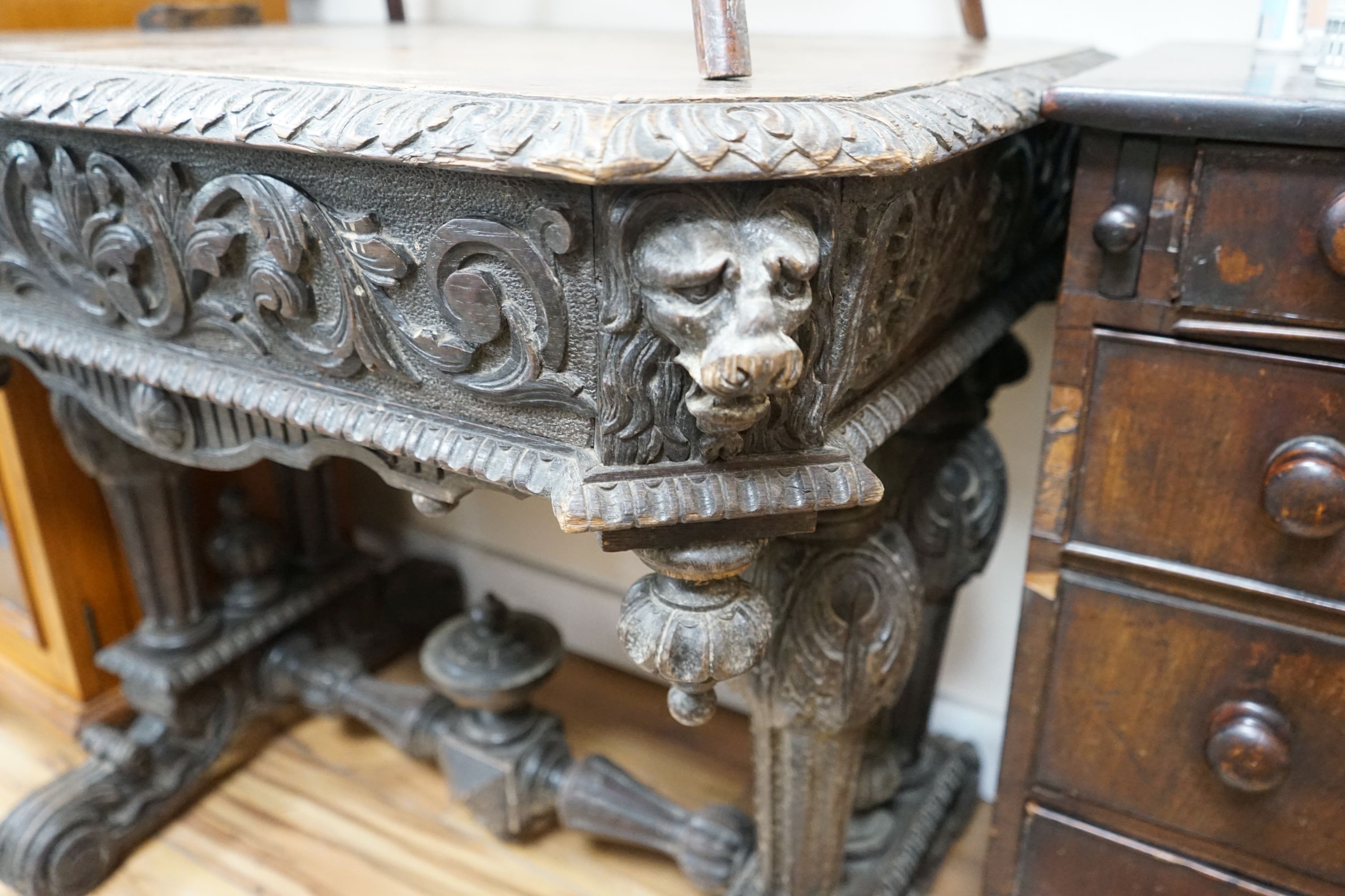 A late 19th century Flemish octagonal carved oak centre table, width 80cm, depth 60cm, height 72cm